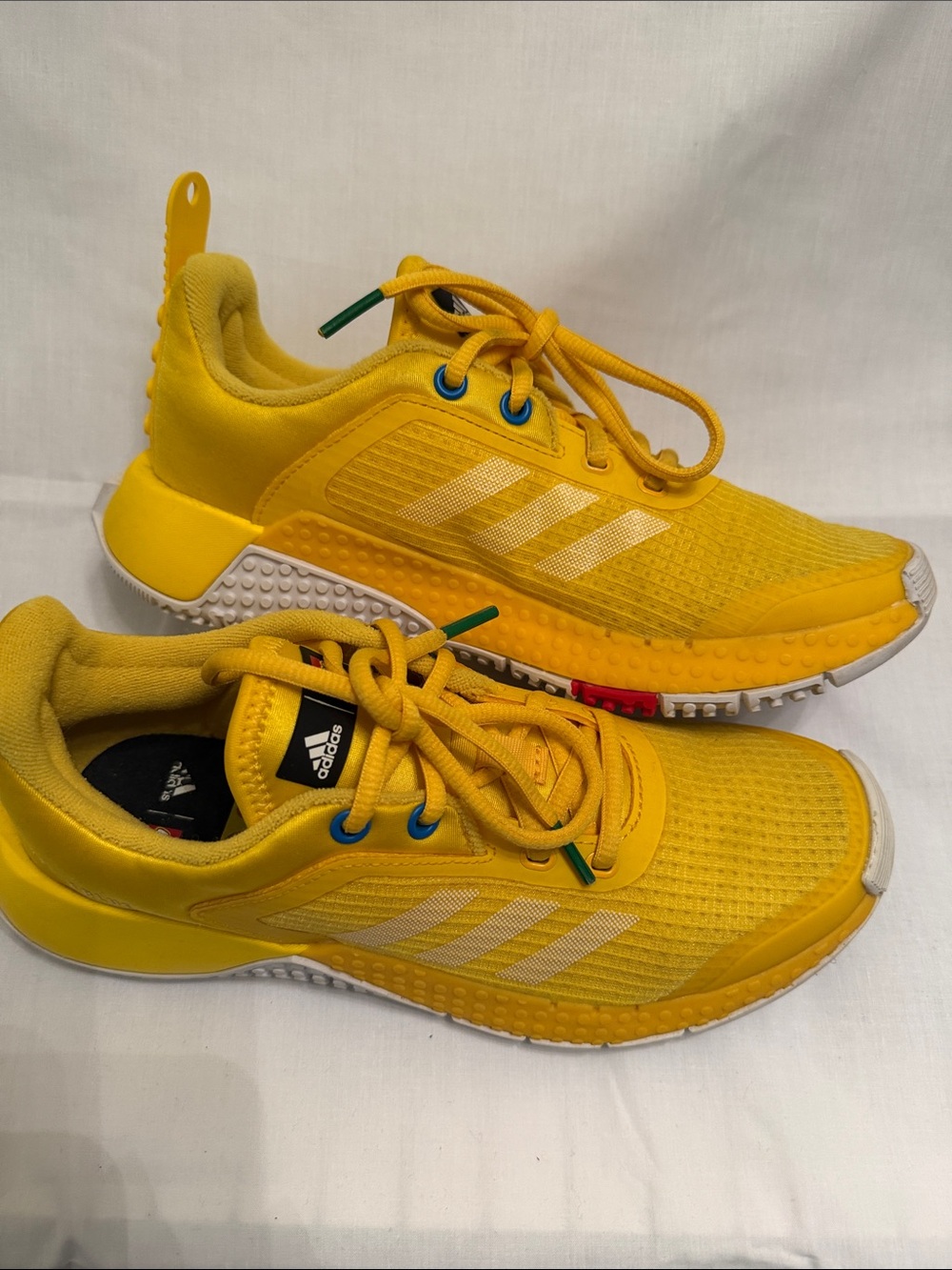adidas Kids Yellow Athletic Sneakers with White Stripes
